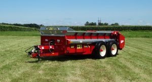 H&S 3237 heavy duty manure spreader in a field