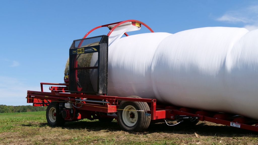 H&S 1100 linewrap bale wrapper wrapping round hay bales
