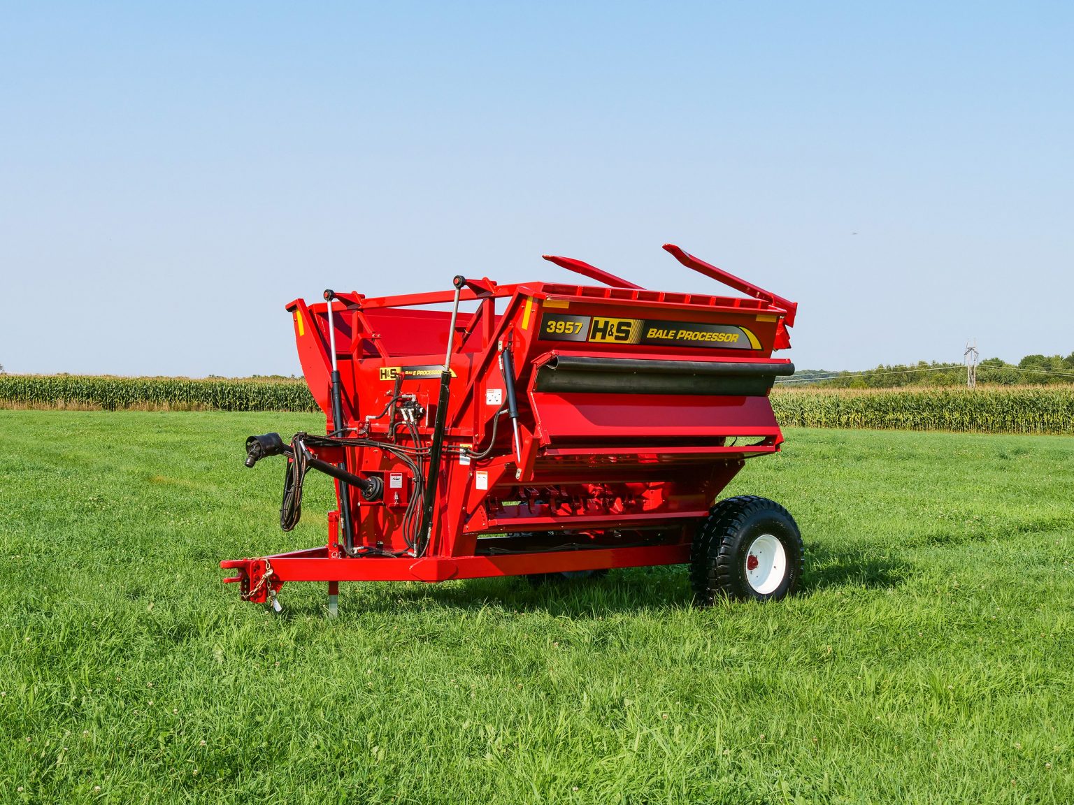 H&S 3957 left side discharge bale processor product