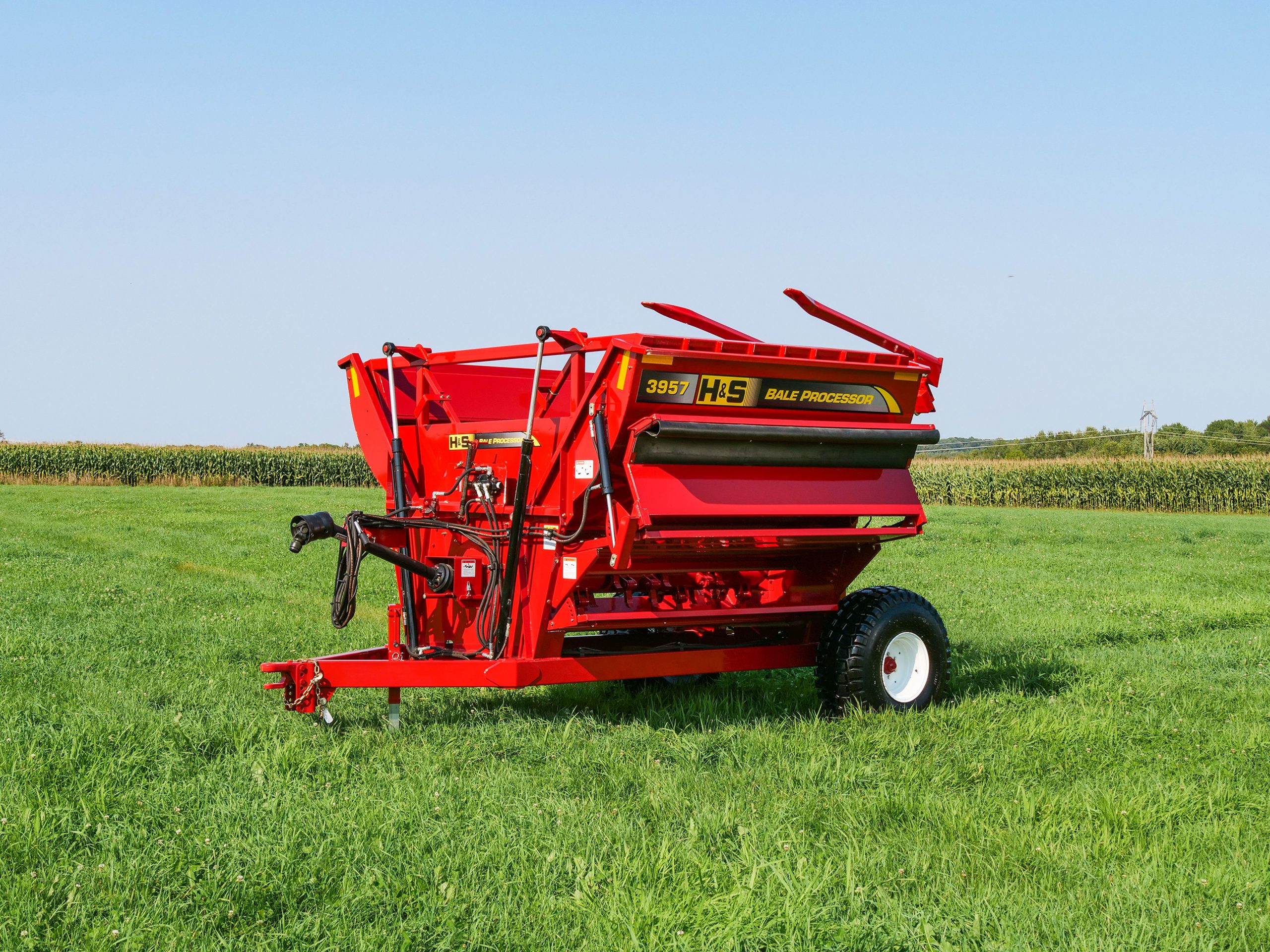 H&S 3957 left side discharge bale processor product
