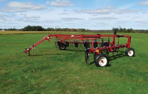 H&S 4112 hi-capacity 12-wheel rake open in a field