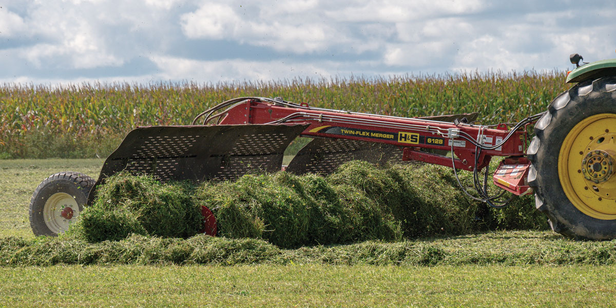 H&S 6128 Twin-Flex merger merging alfalfa in a hay field