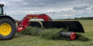 H&S 6132 Twin-Flex merger merging alfalfa in a hay field