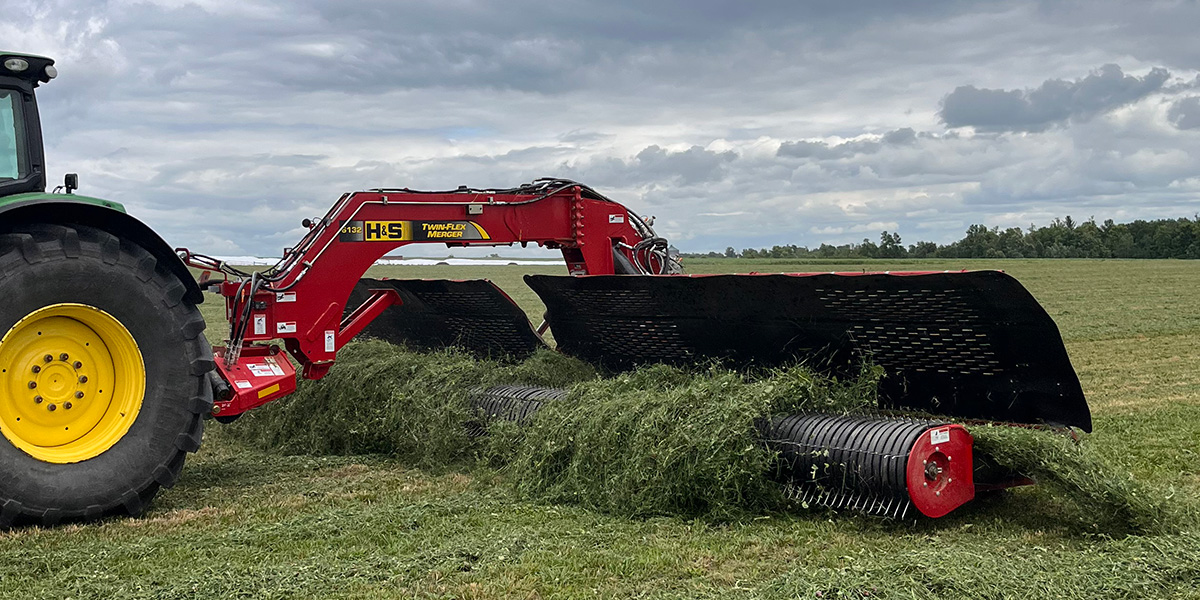 H&S 6132 Twin-Flex merger merging alfalfa in a hay field