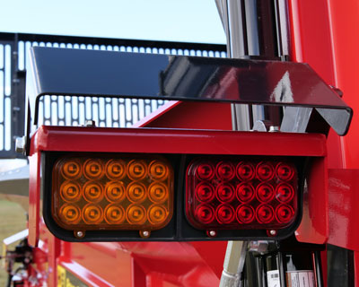 closeup of H&S 6138 PowerSpread manure spreader actuator light covers
